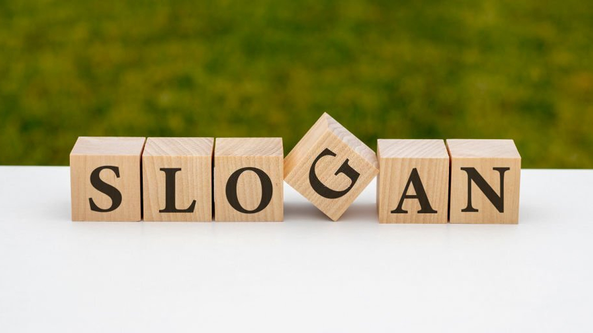 Slogan word written on wooden blocks on a light table