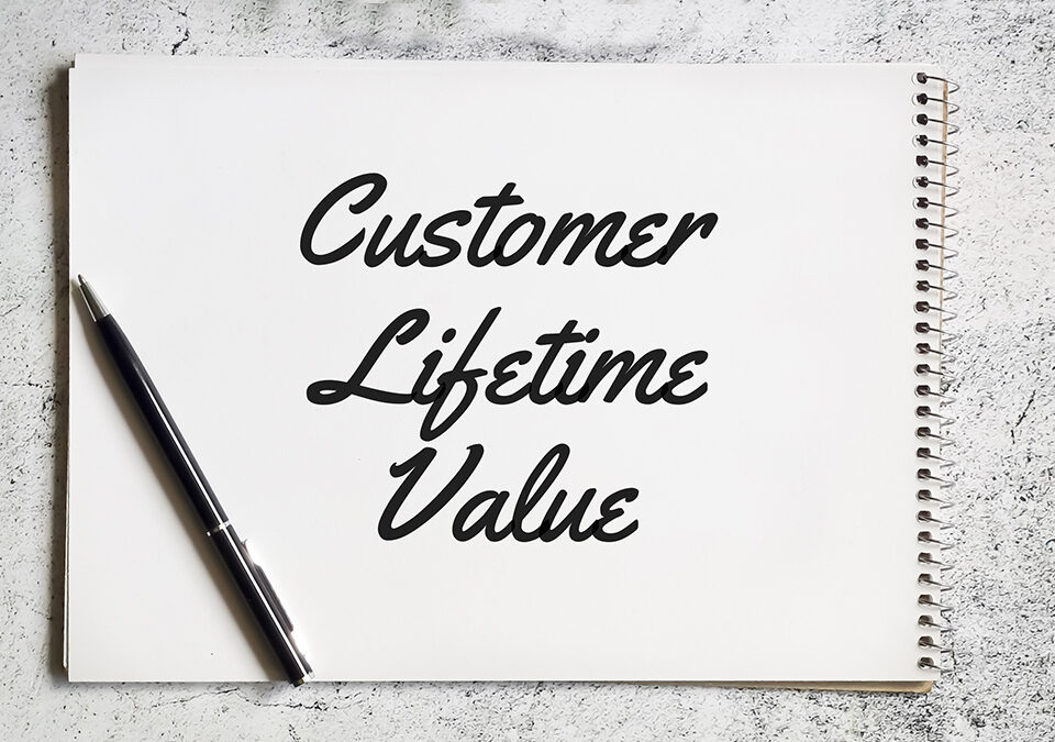 Selective focus notebook written customer lifetime value