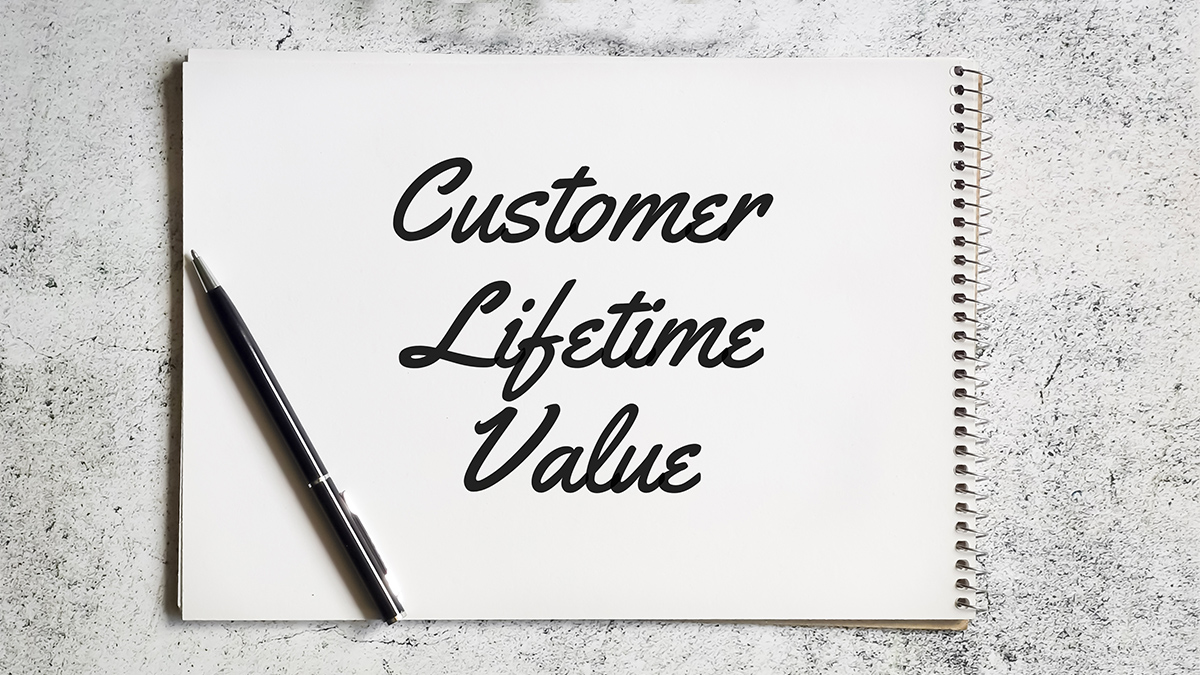 Selective focus notebook written customer lifetime value