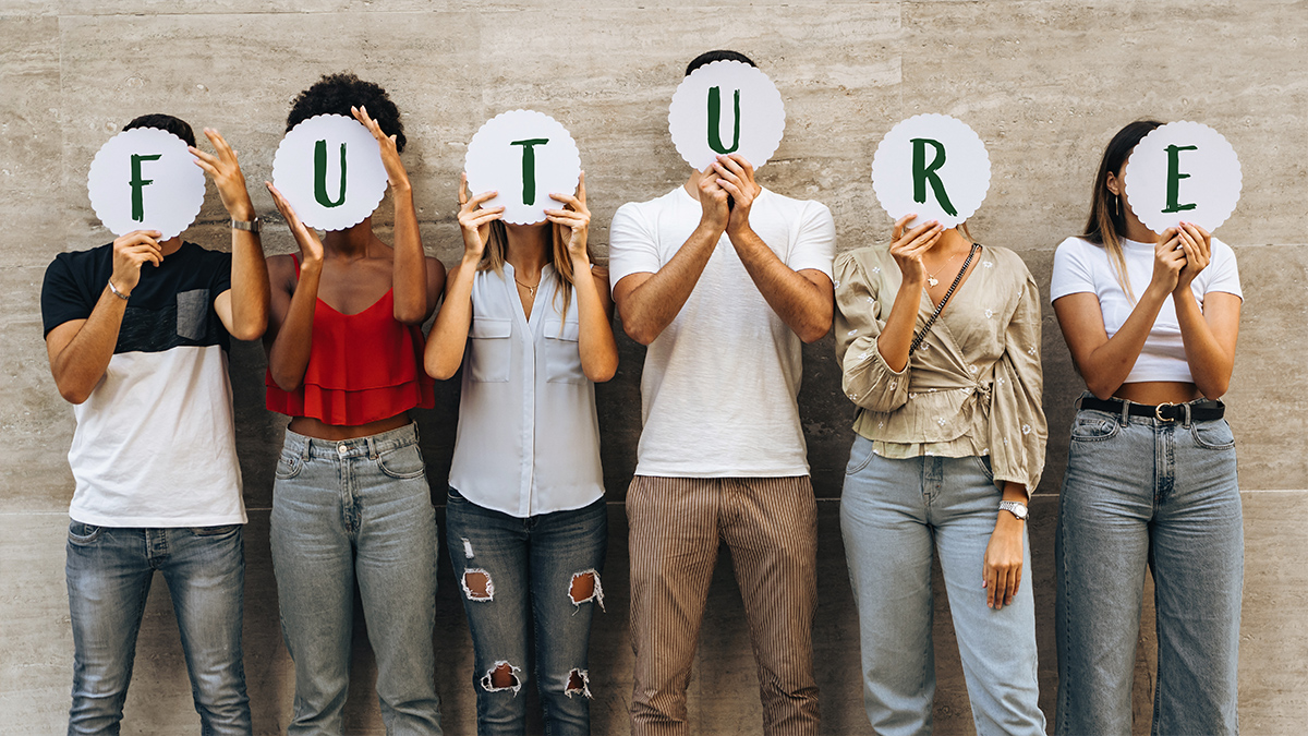 Some youths holding future word letters