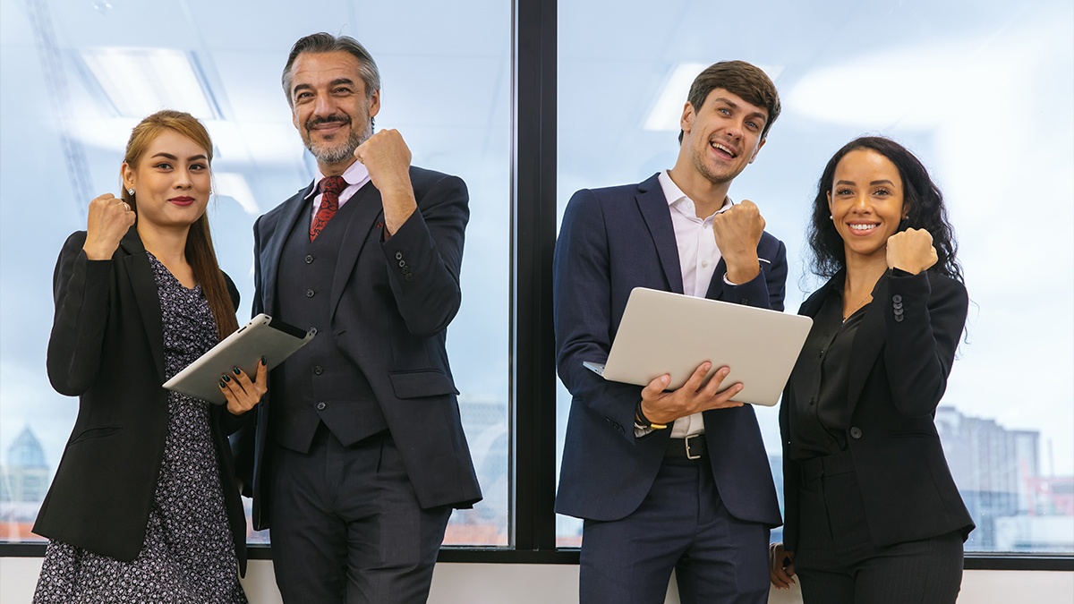 Successful and happy business group after a meeting