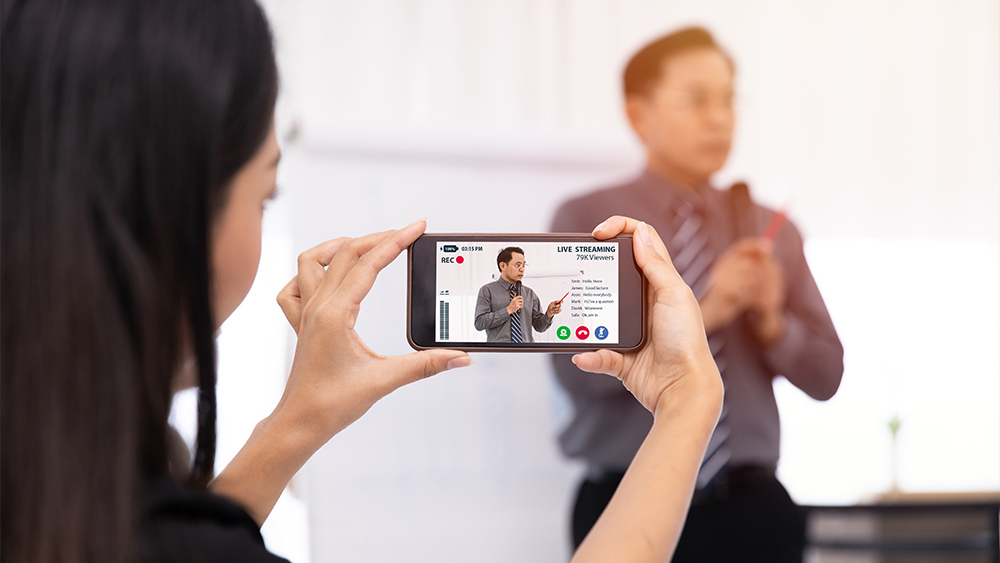 Woman recording live stream video