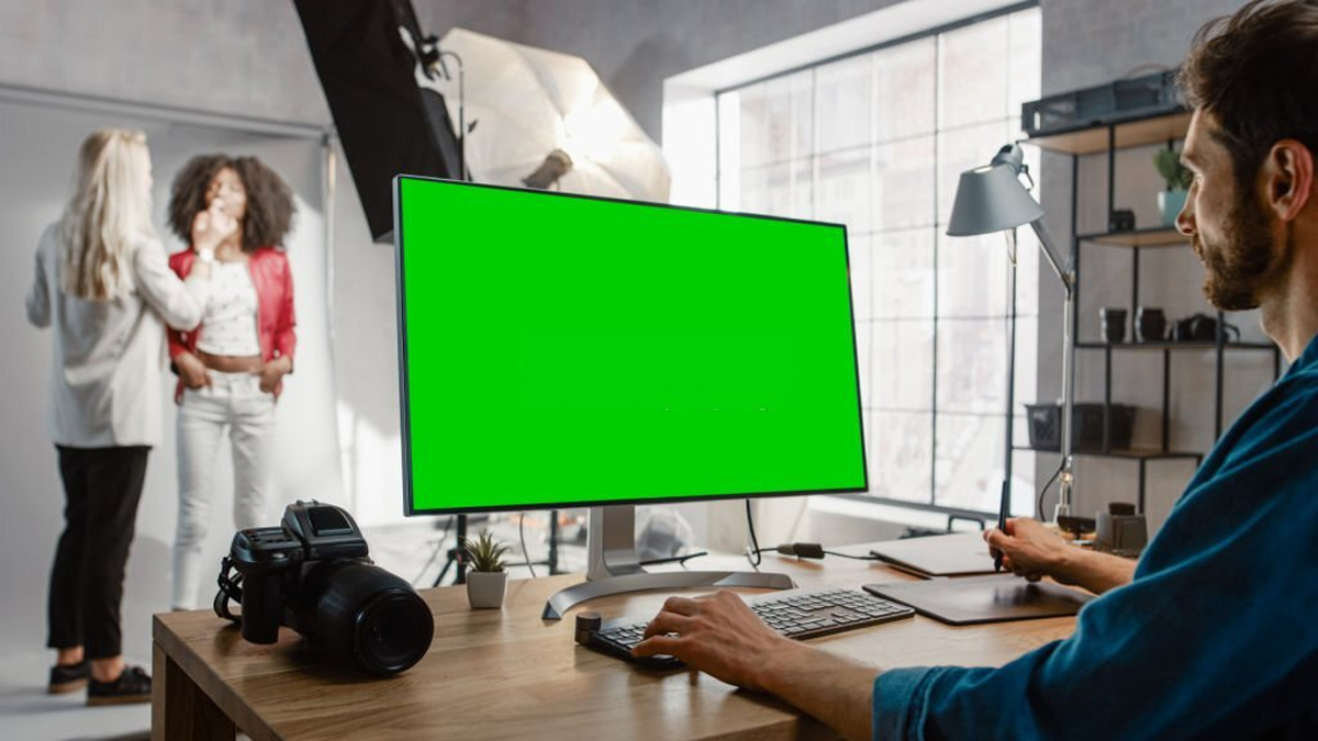 Backstage photoshoot make up artist applies makeup