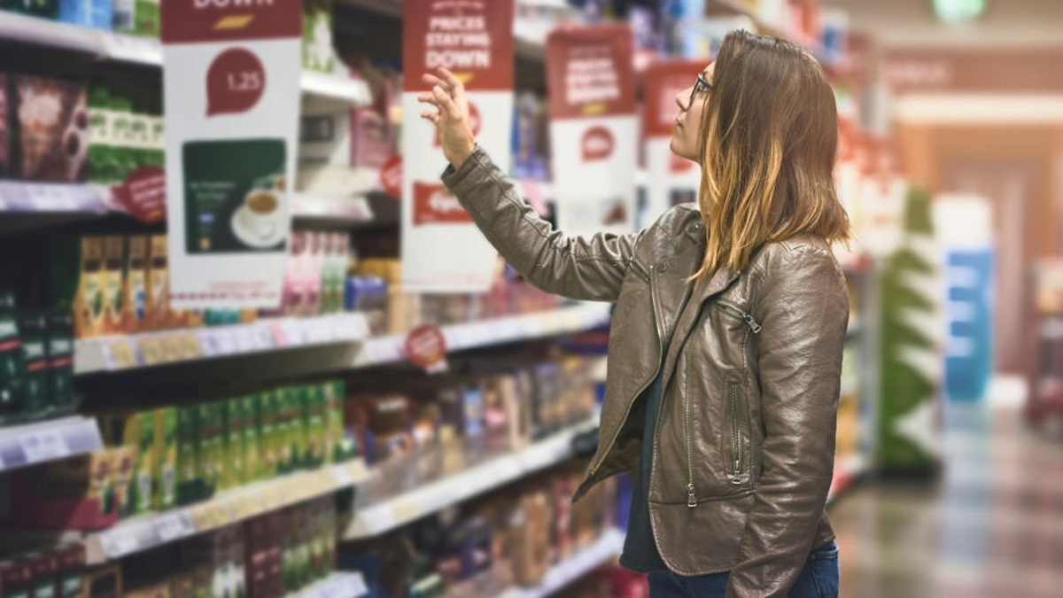 Woman buying from supermarket because retail branding